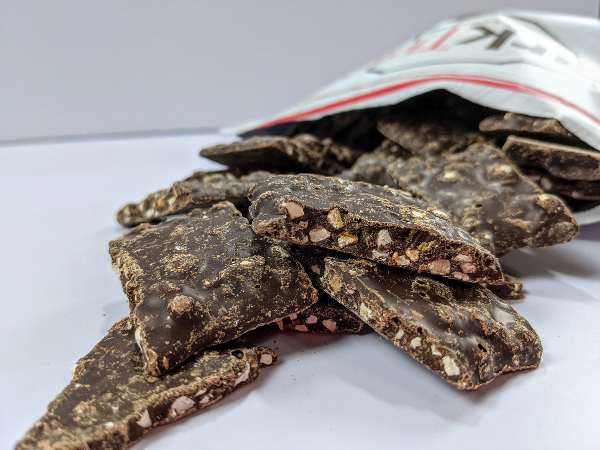 Bark Thins Snacking Chocolate (spill out scattered close up)