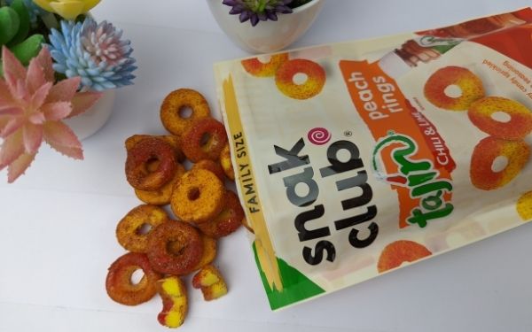 (Cross section spill from above) Snak Club Tajin Peach Rings - BanhMiFresh.com