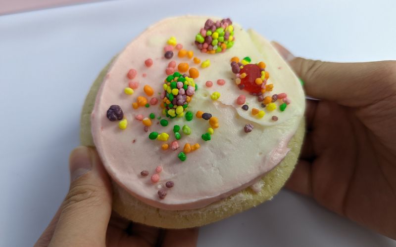 Crumbl cookies strawberry limeade with nerds in my hands - banhmifresh.com